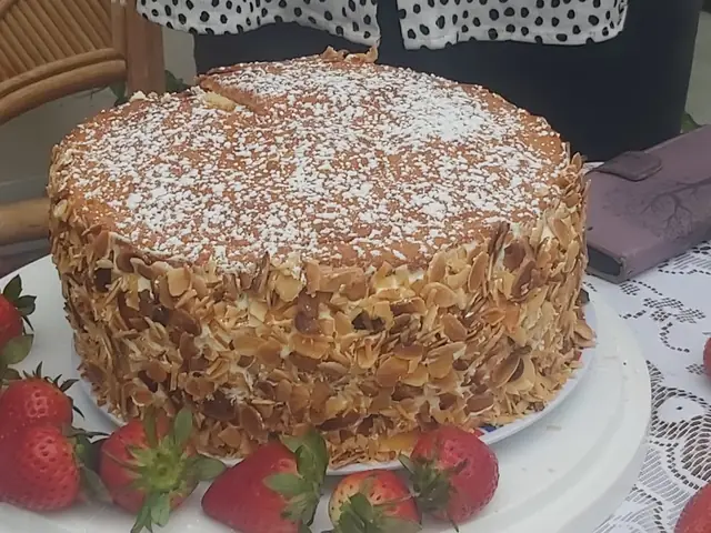 Cake decorated with fresh strawberries