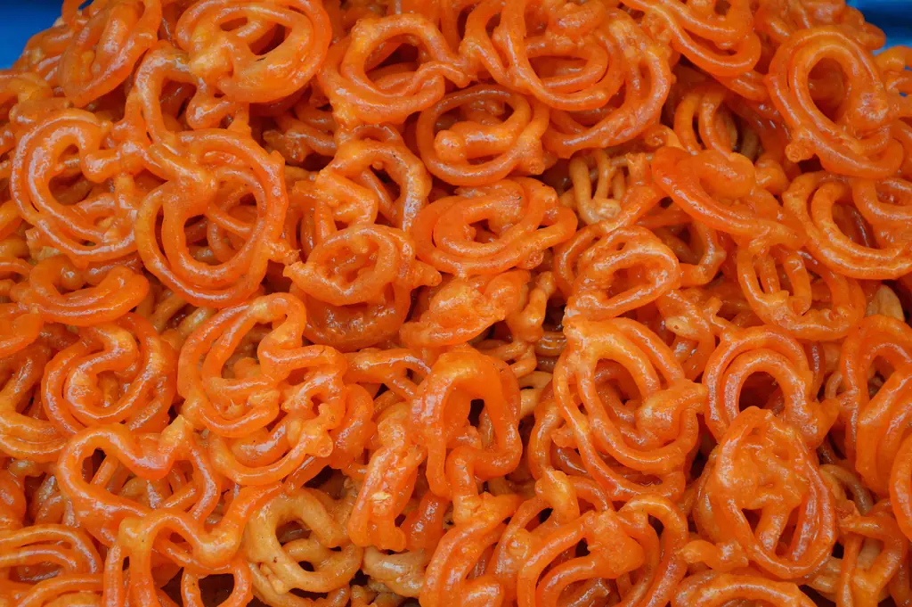 A heap of bright orange jalebi at a sweet shop in Howrah, West Bengal