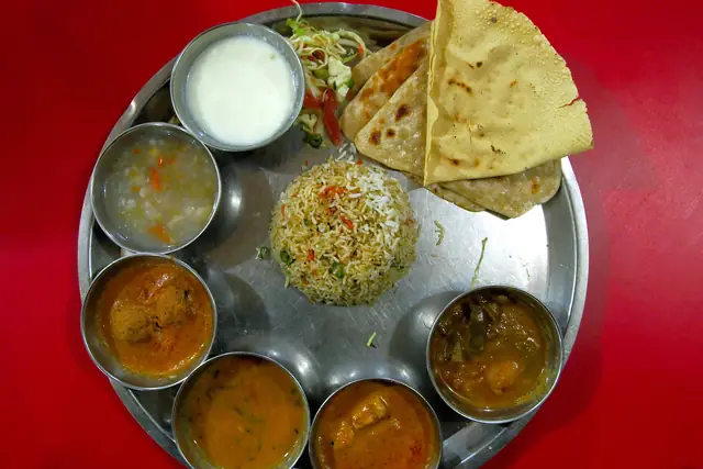 Vegetarian Indian thali with dal, sabzi, rice and roti