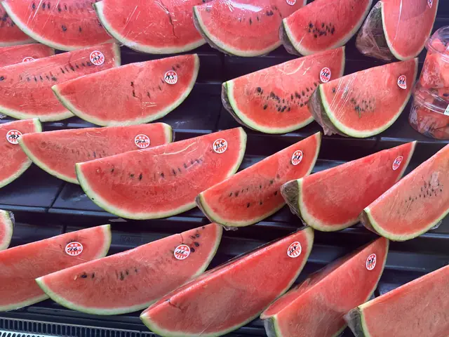 Watermelon slices laid out in rows